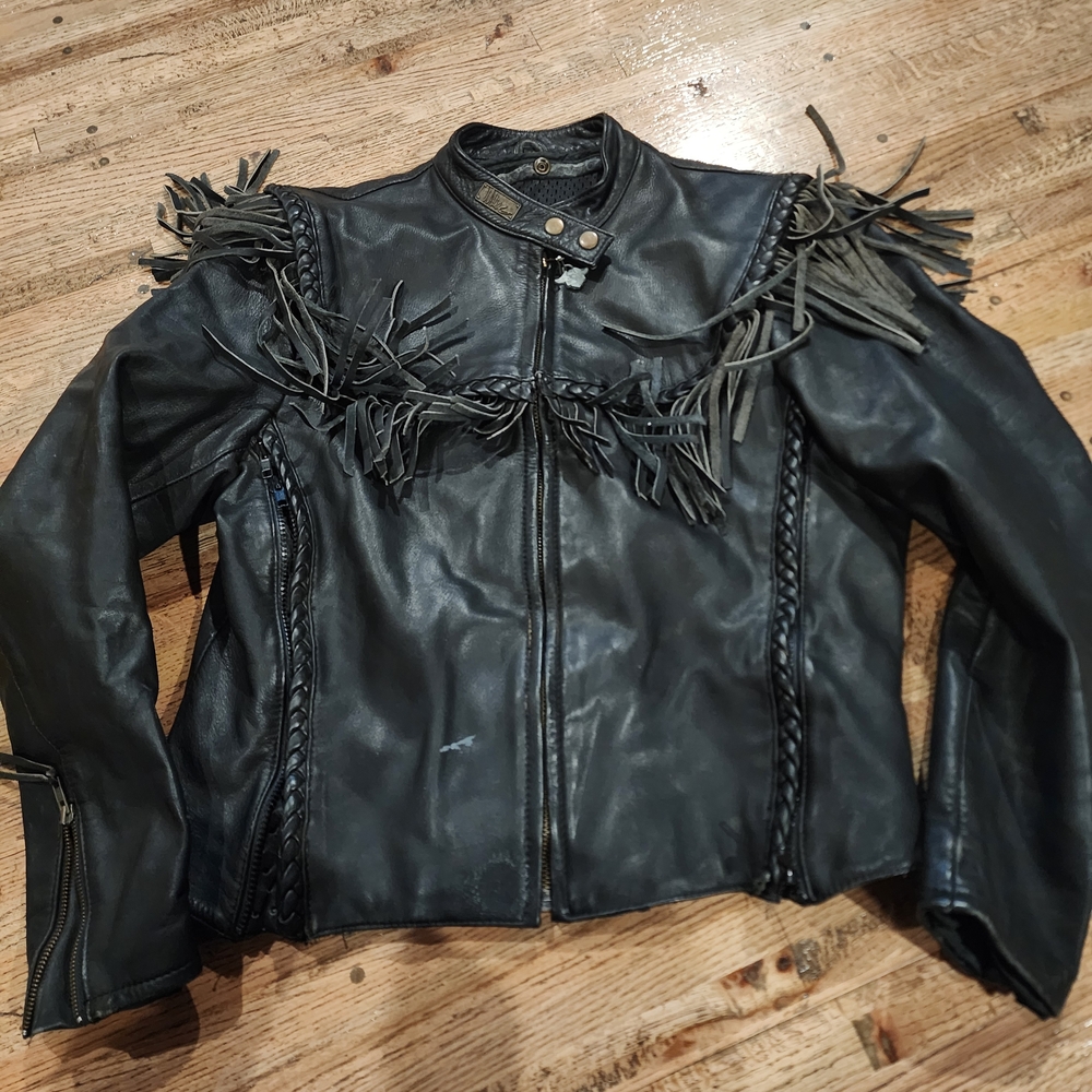 Vintage Harley-Davidson Willie G leather jacket featuring braided details